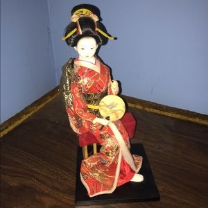 porcelain geisha doll
